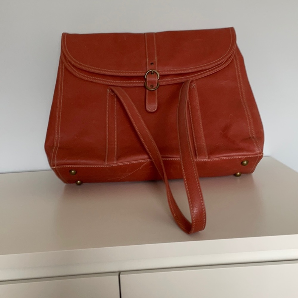 Hand bag button, size 16” wide and 14” long